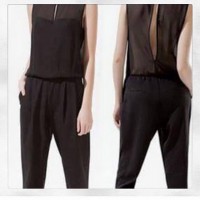 Enterito negro detalles de gasa y transparencia.  Talla M